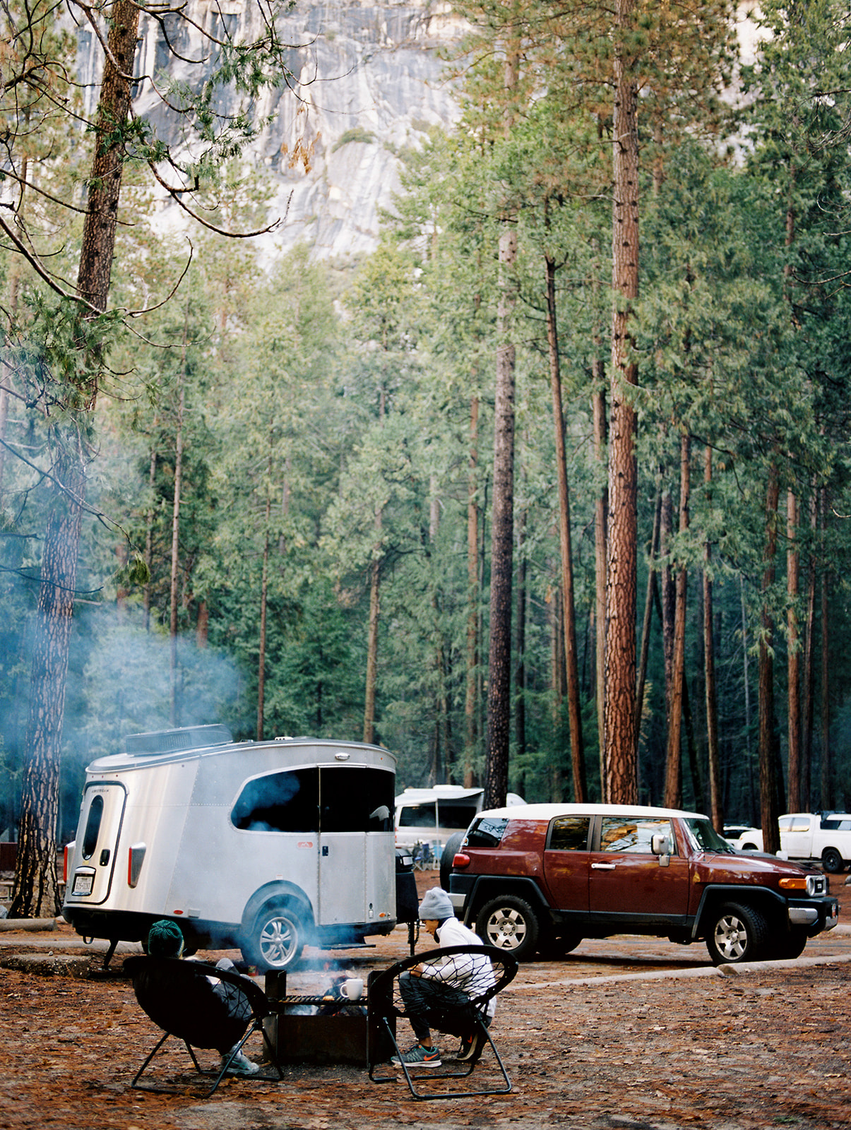 Our airstream and car parked in our campground at Yosemite National Park. We were surrounded by the campfire on this cold November day.