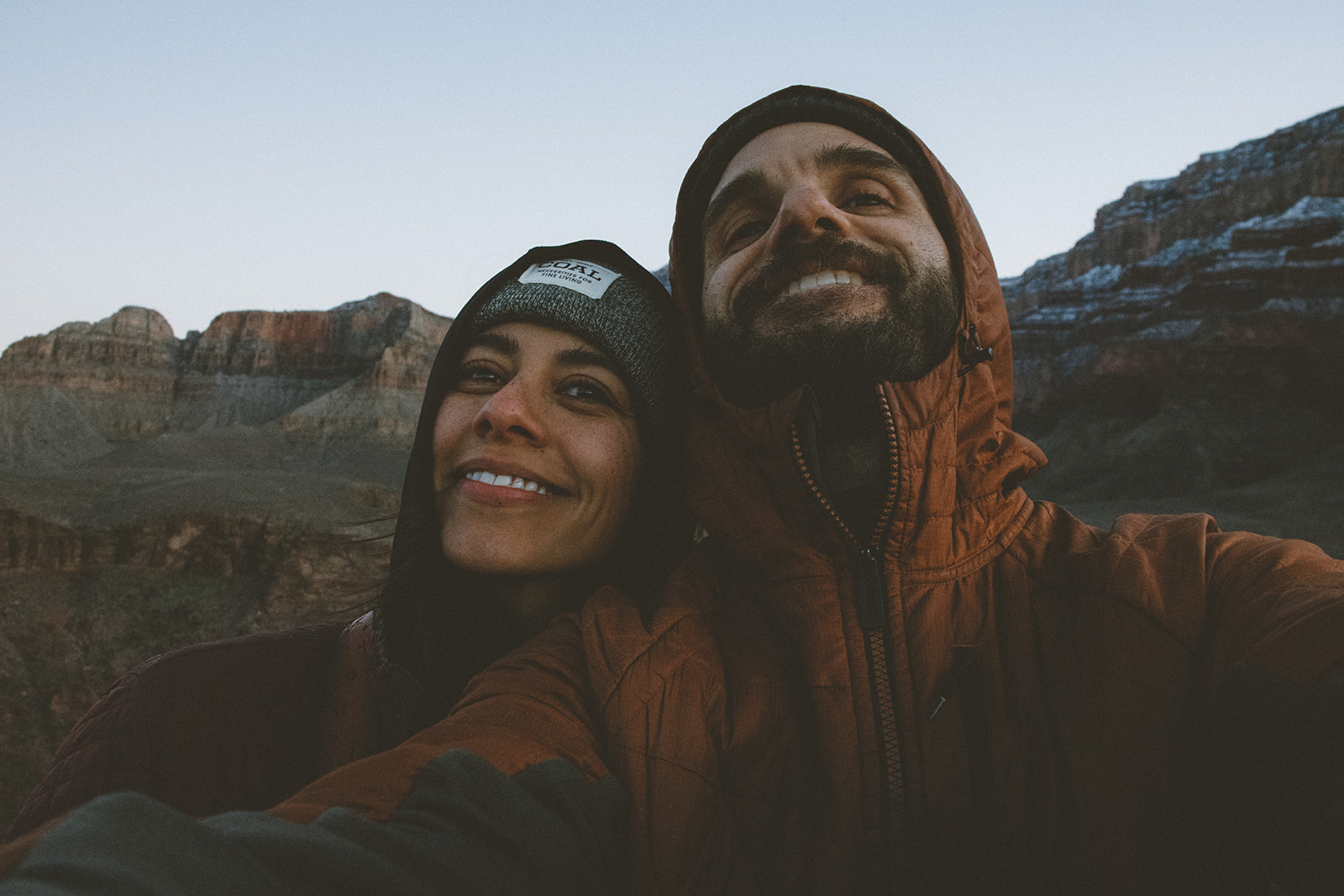 myself and my boyfriend Bob taking a selfie during the middle of hiking the Grand Canyon. We are grinning from ear to ear in awe of this trip.