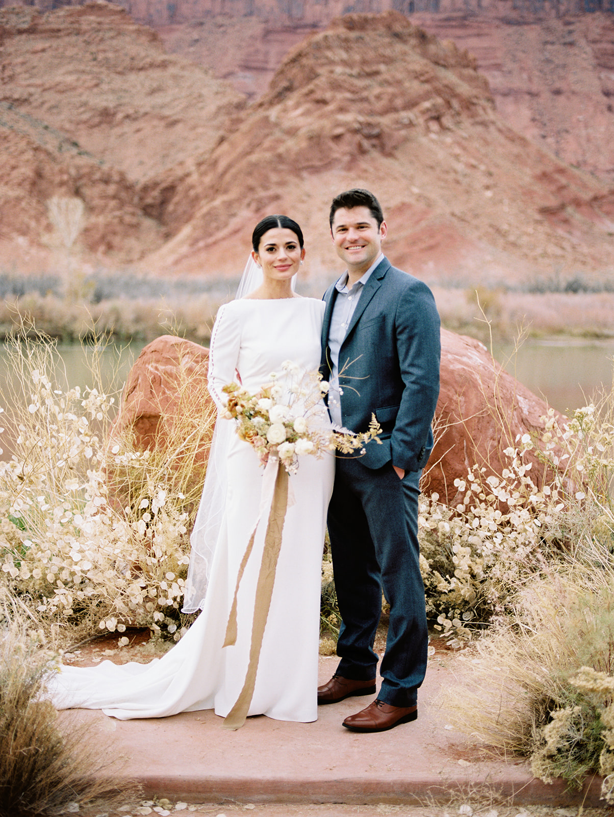 bride and groom at their intimate destination wedding in moab utah
