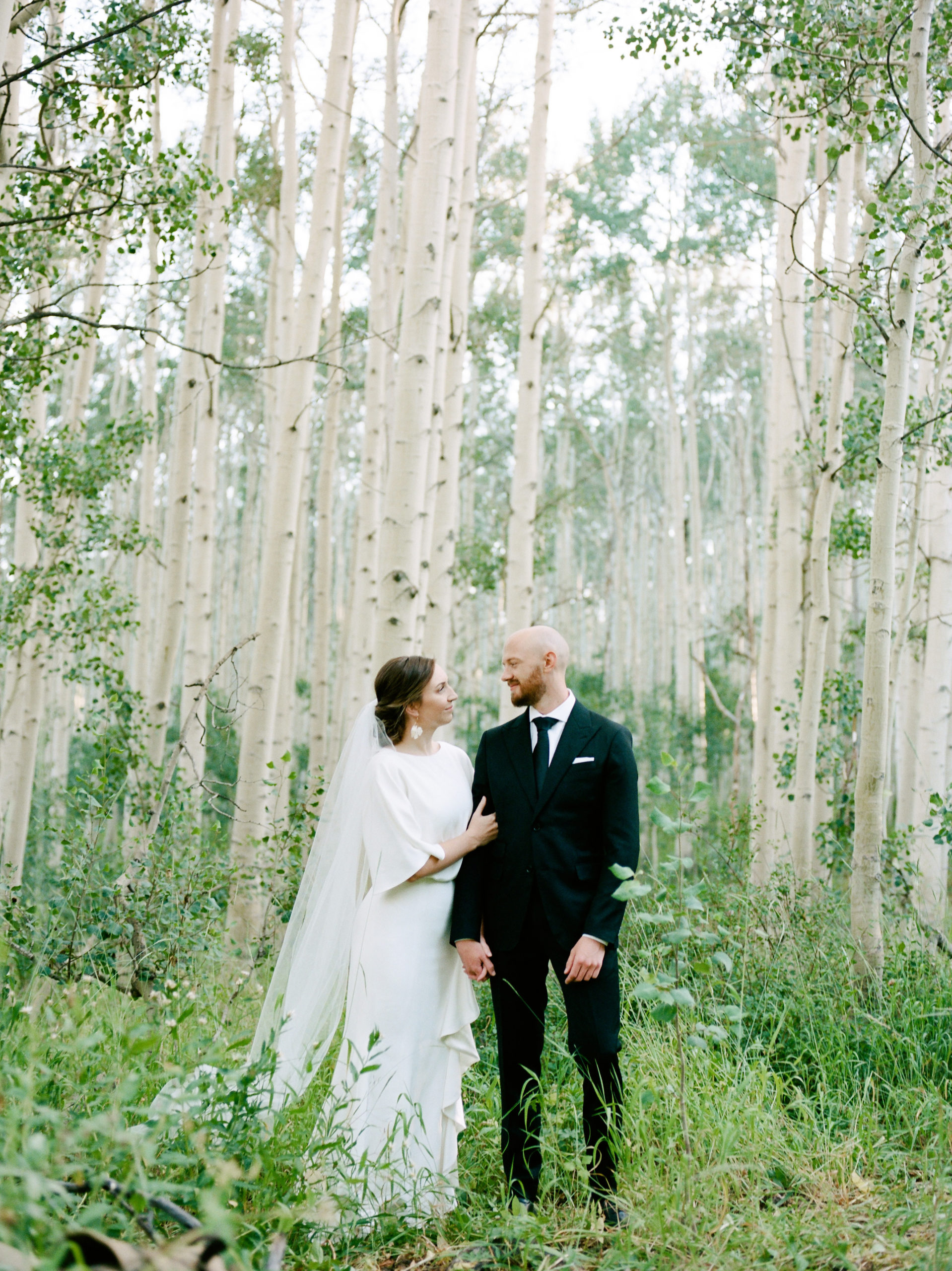 bride and groom portraits among aspen trees in Utah