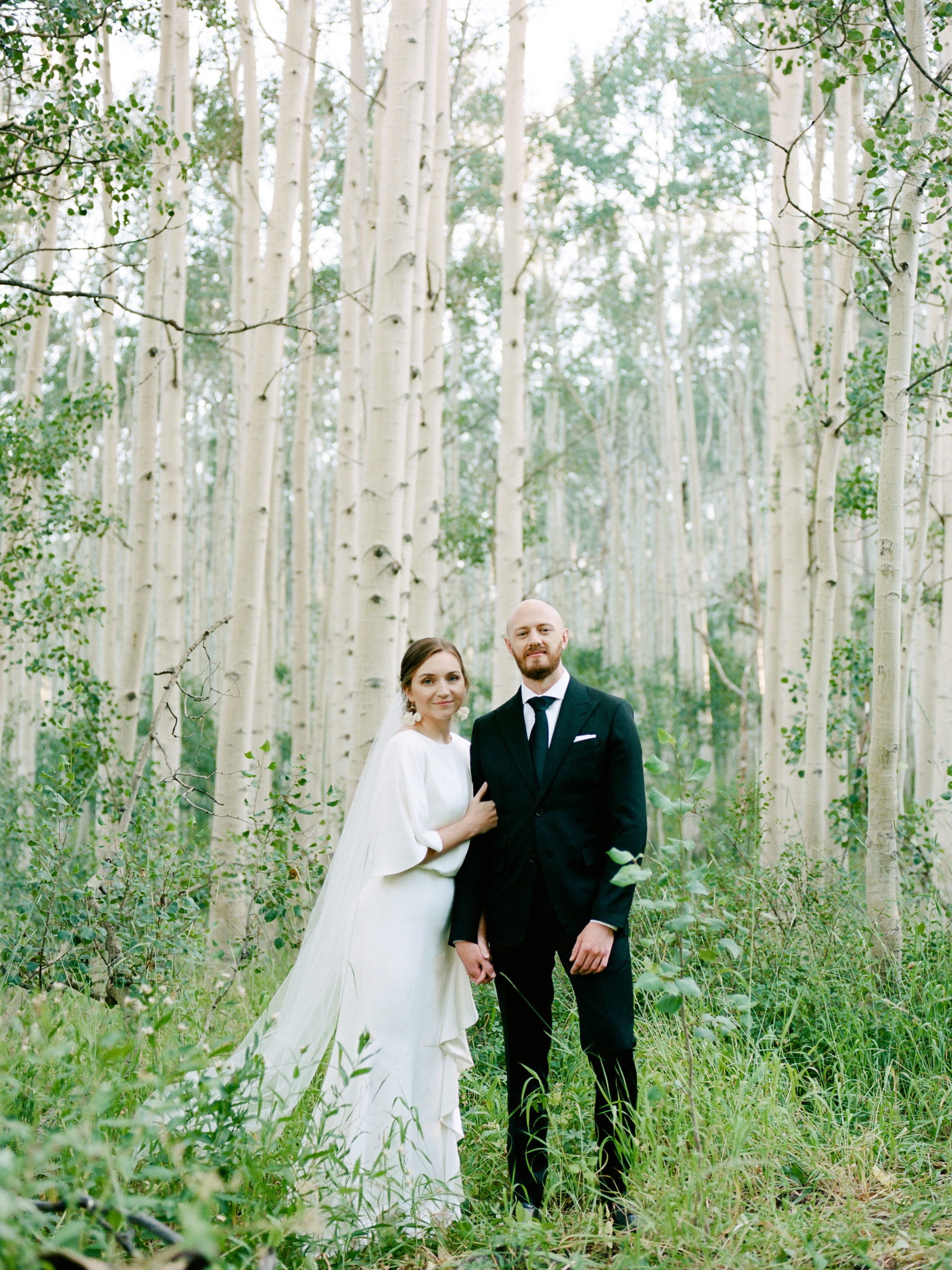 bride and groom portraits surrounded by aspen trees