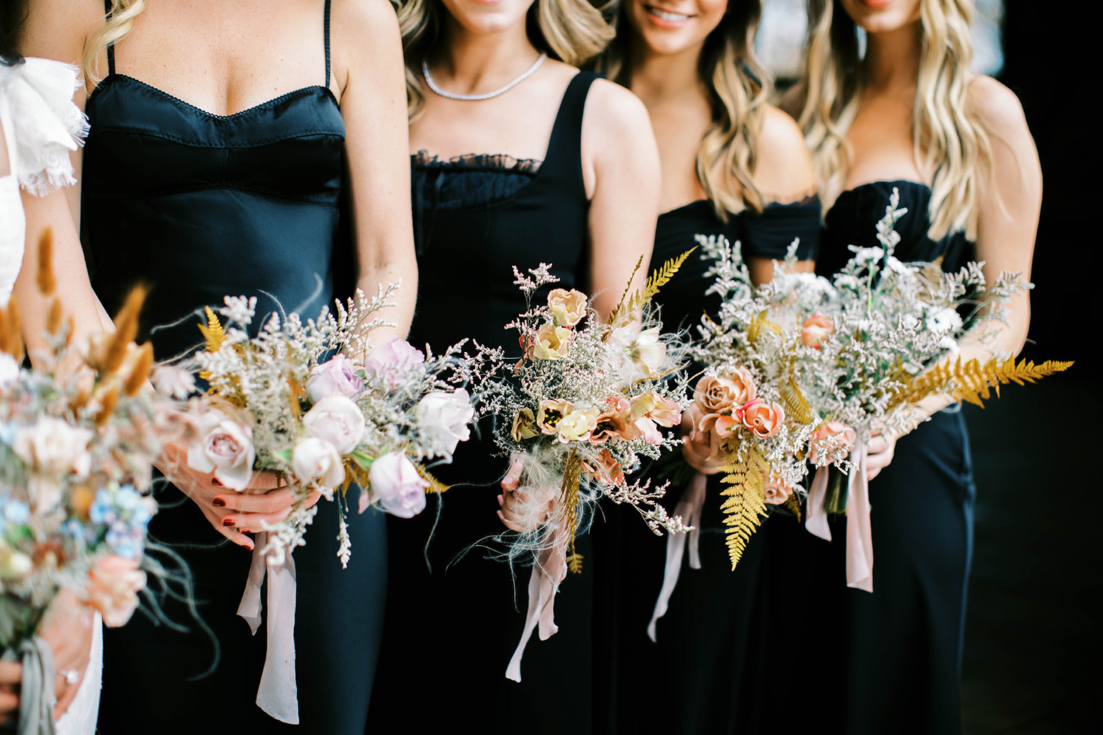 eclectic bridesmaids bouquets for a vintage aesthetic ranch wedding in park city utah. photo by megan robinson photography. 