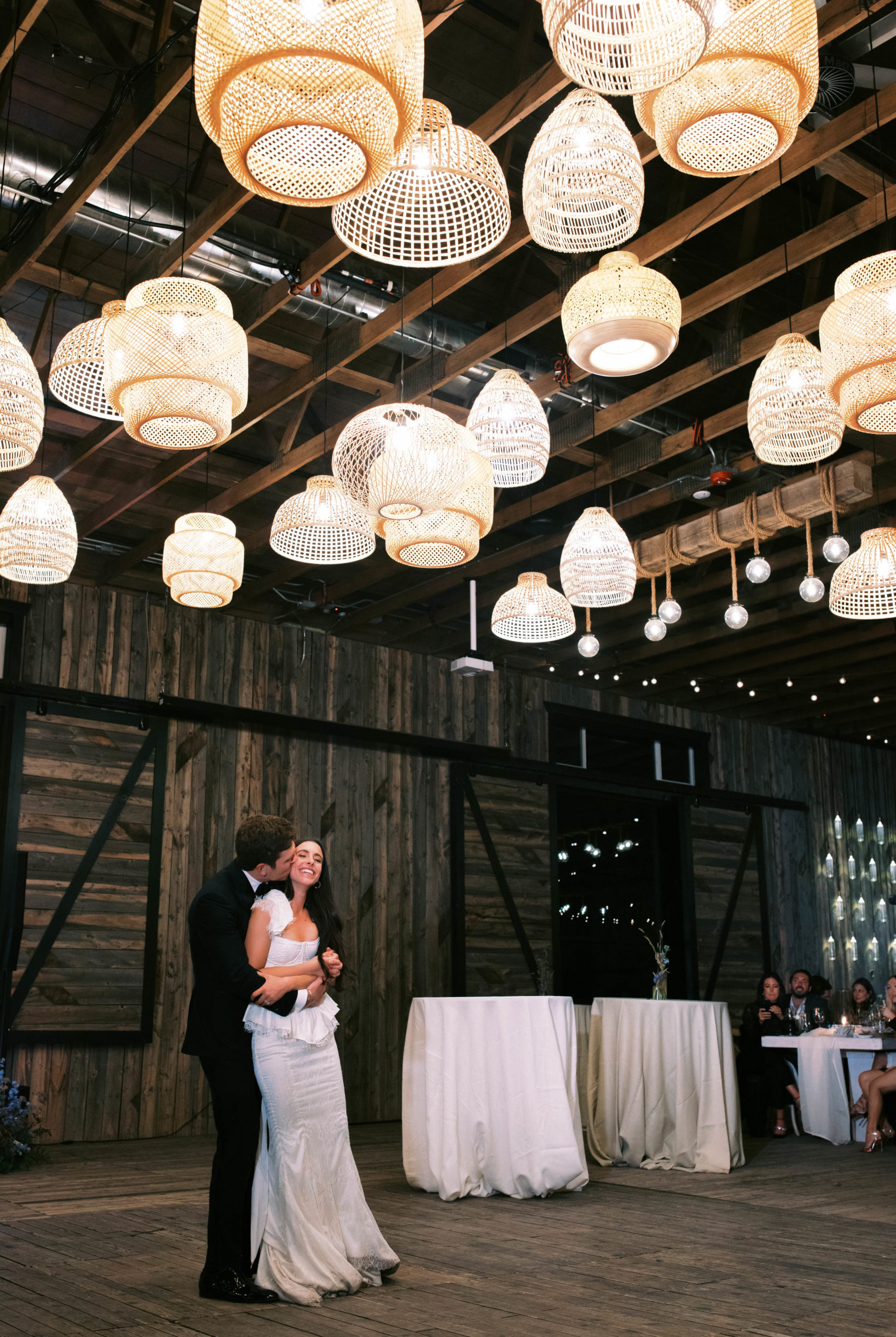 a bride and groom embrace during their first dance at the lodge at blue sky, a ranch wedding venue in wanship utah. photo by megan robinson photography
