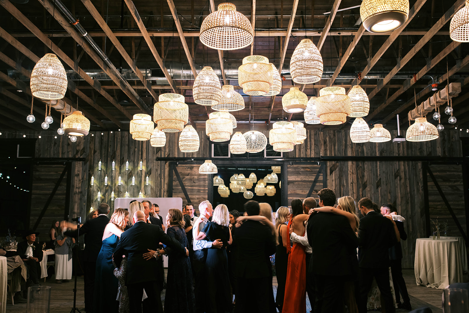 a bride and groom dance with their guests at their ranch wedding reception at the lodge at blue sky in wanship utah. photo by megan robinson photography