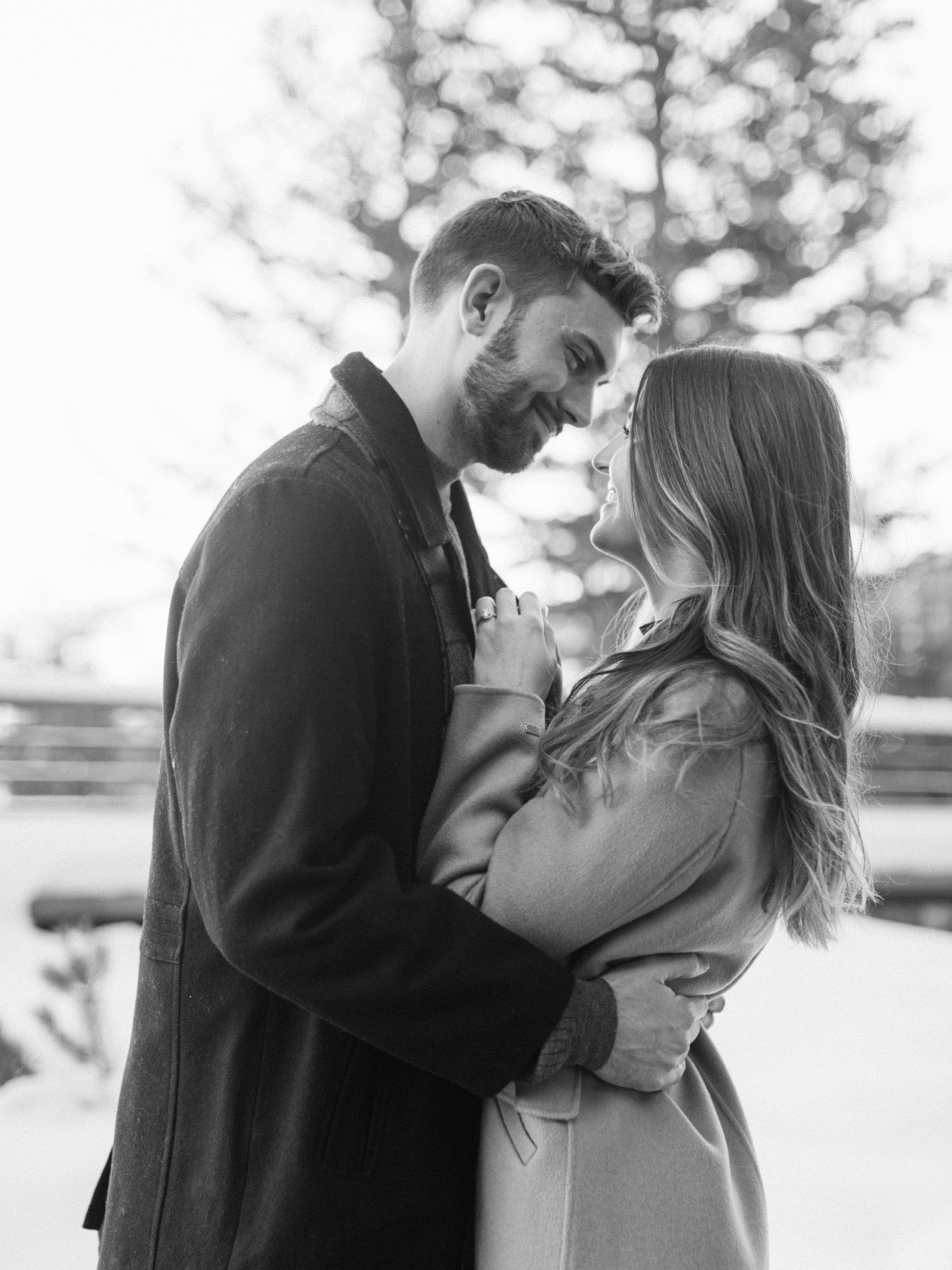 downtown winter engagement photos in park city utah. photo taken by Megan Robinson Photography