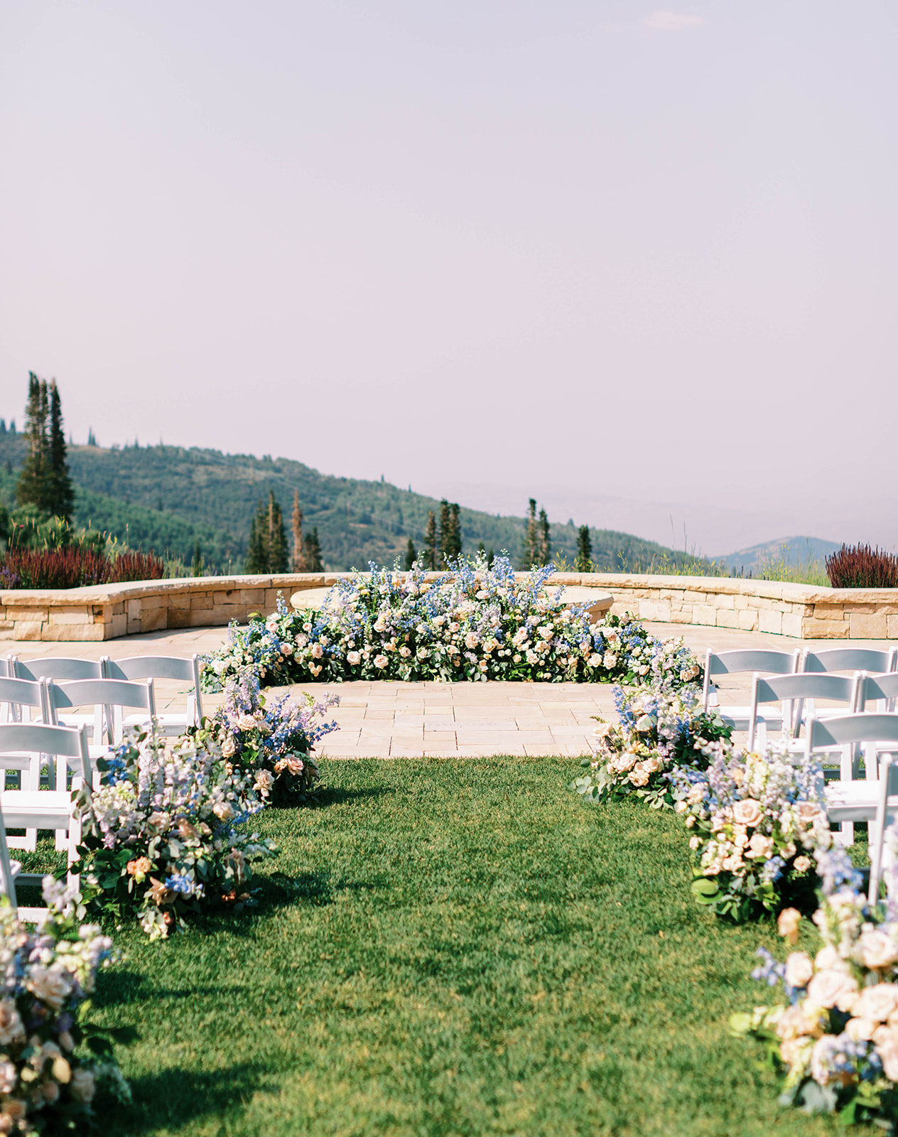 garden party wedding ceremony flowers at a montage deer valley resort wedding in park city utah. photo by megan robinson photography