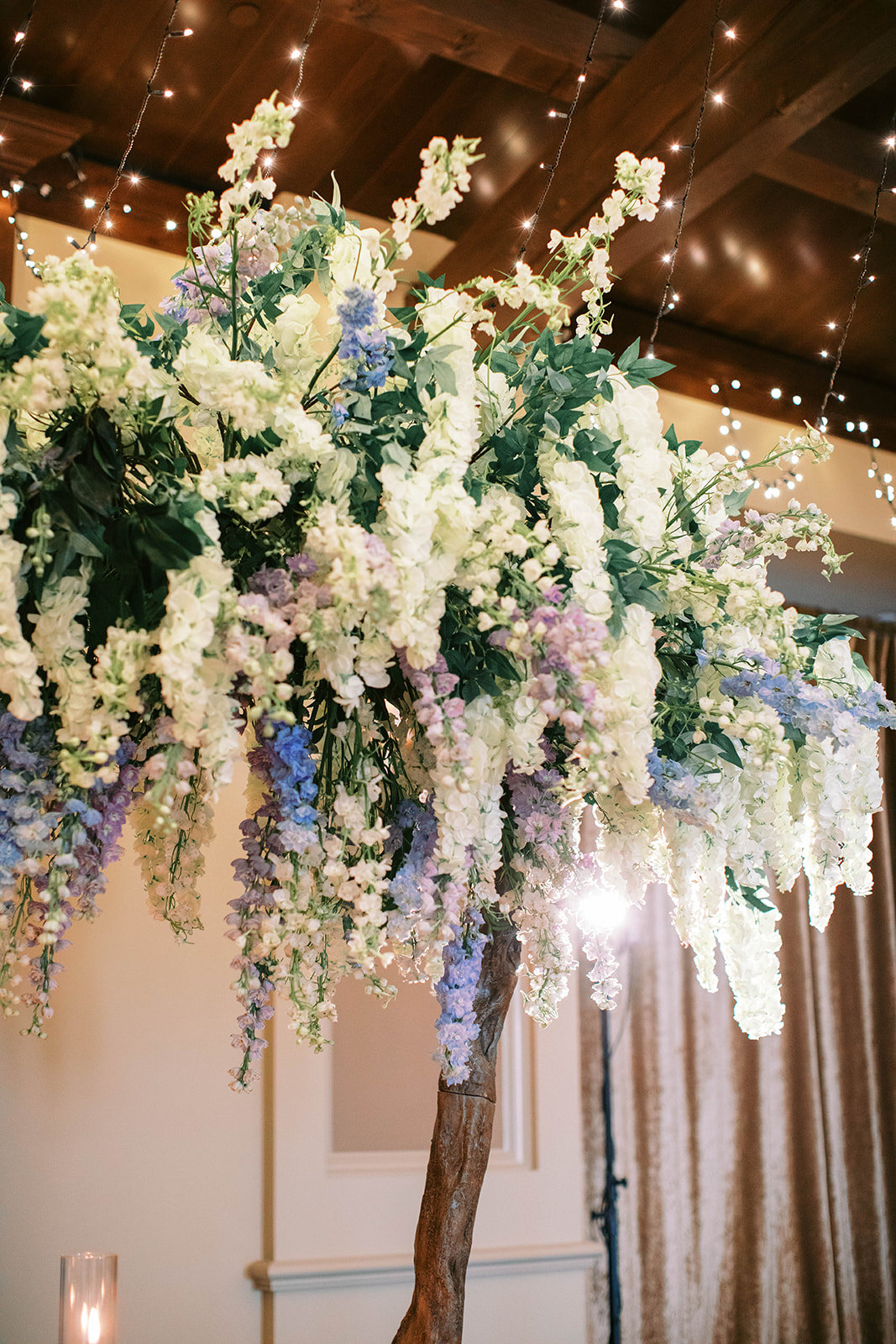 floral arrangement hangs over the head table at this montage deer valley resort wedding in park city. photo by megan robinson photography