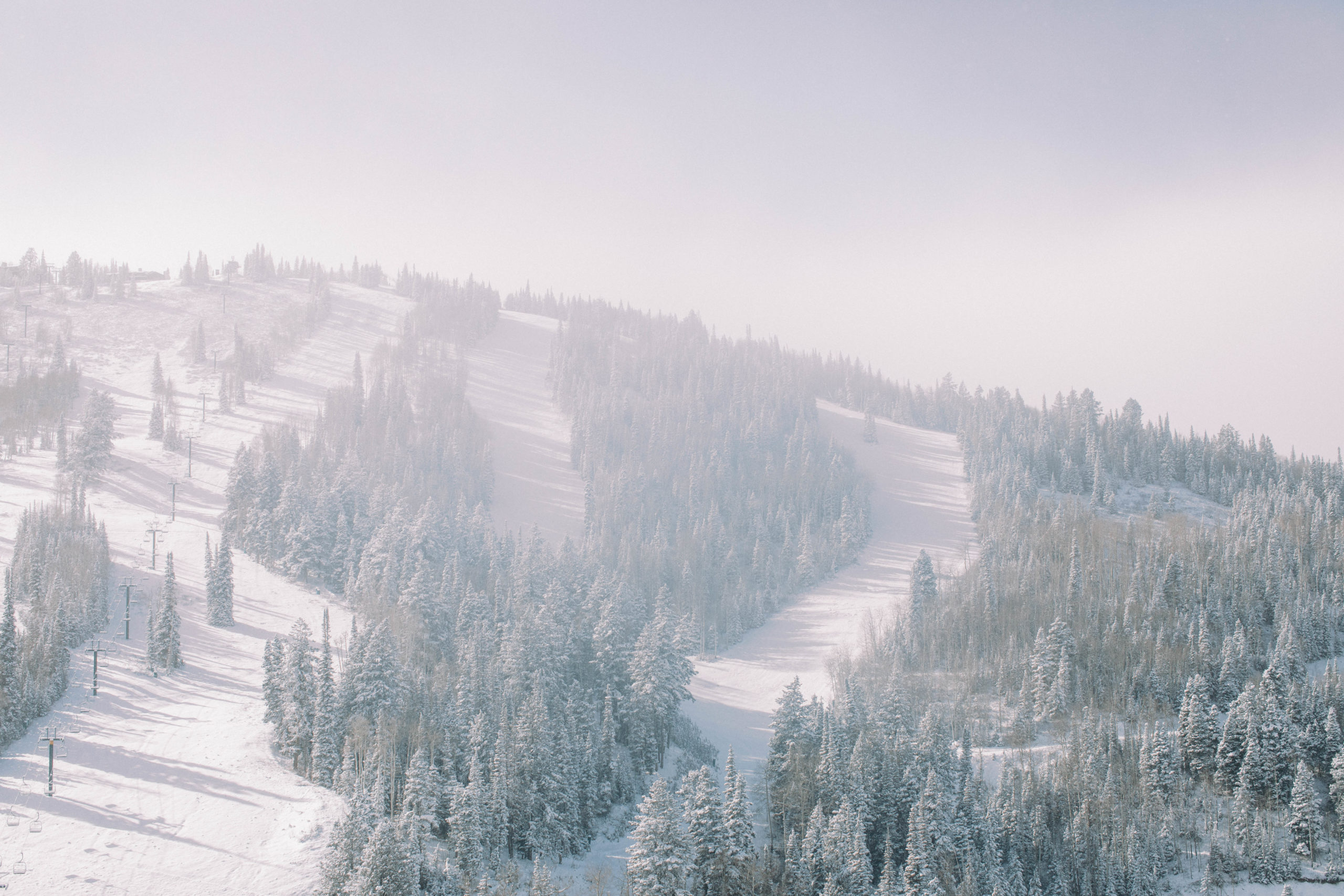 a view of the snowy ski slopes at deer valley resort in park city utah. photo taken by Megan Robinson Photography