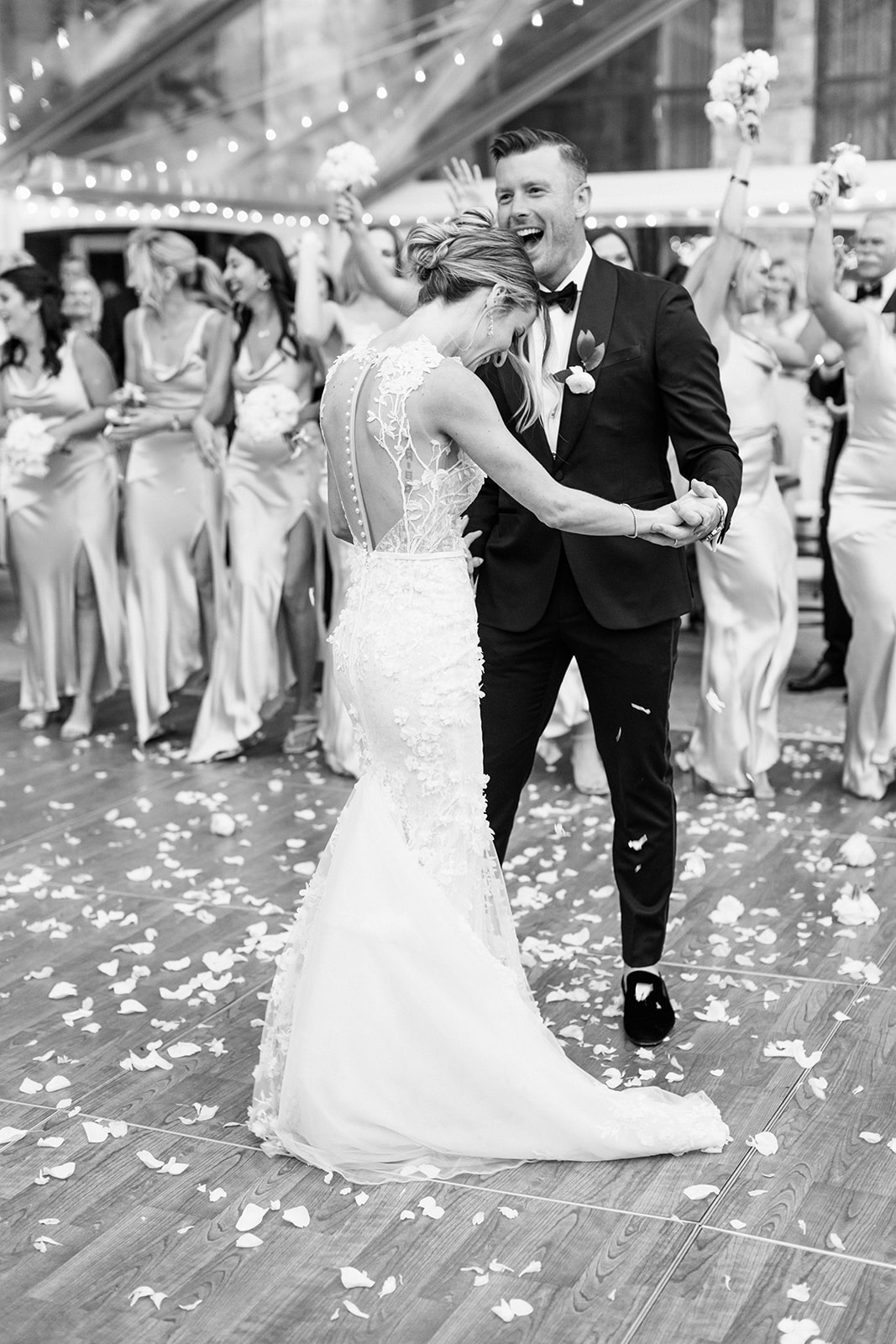 a couple dances during their entrance at their st regis deer valley wedding
