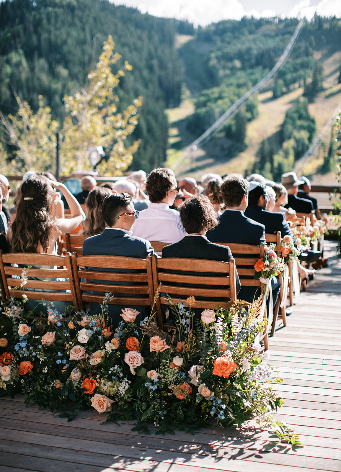 wedding ceremony guests wait for the couple at stein eriksen lodge in park city utah