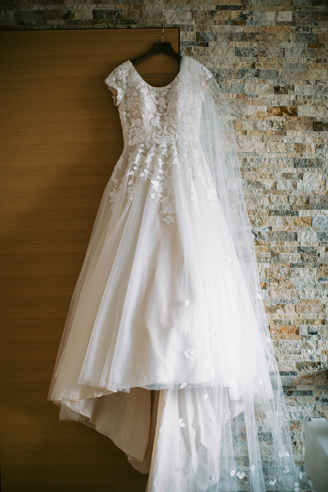 a classic lace ballgown wedding dress for a wedding in park city utah at the lodge at blue sky 